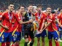 Spain's Mikel Merino, Mikel Oyarzabal, Alex Remiro, Robin Le Normand and Martin Zubimendi celebrate on July 14, 2024