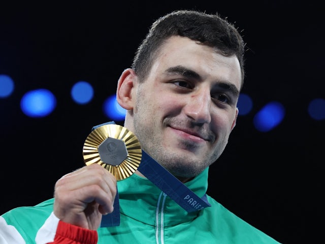 Gold medallist Semen Sergeevich Novikov of Bulgaria poses with his medal on August 8, 2024