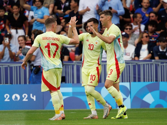 Spain's Alex Baena celebrates scoring against France at the Olympics on August 8, 2024