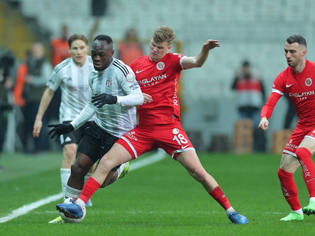 Jackson Muleka (40 Besiktas) and Jakub Kaluzinski (18 Antalyaspor) during the Turkish Super League football match on August 8, 2024