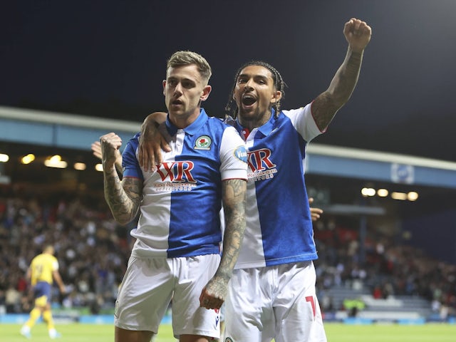 Blackburn Rovers midfielder Sammie Szmodics (8) scores a goal 3-1 and celebrates on August 9, 2024