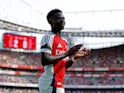 Arsenal's Bukayo Saka claps the fans on August 17, 2024