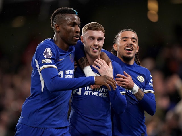 Chelsea's Cole Palmer celebrates scoring their second goal with Nicolas Jackson and Malo Gusto on April 4, 2024