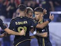  Crisitan Olivera of Los Angeles FC is congratulated by his teammates on August 7, 2024