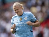 Erling Haaland of Manchester City smiles after scoring his penalty during the shoot out during the 2024 FA Community Shield match between Manchester United and Manchester City at Wembley Stadium on August 10, 2024