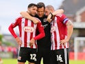 Reece Cole, Pierce Sweeney and Gary Caldwell after Exeter City's win on August 10, 2024