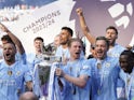 Kevin De Bruyne of Manchester City celebrates with the Premier league trophy