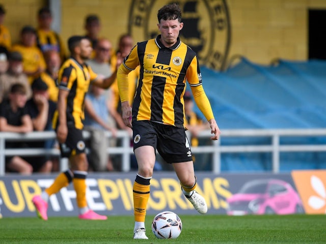 23 year old Boston United defender Mitchell Roberts (4) passes the ball during the National League match between Boston United and Forest Green Rovers at the Jakemans Community Stadium, Boston, United Kingdom on August 17, 2024 [on August 18, 2024]