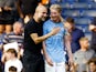 Manchester City manager Pep Guardiola celebrates with Kevin De Bruyne after the match on August 18, 2024