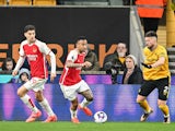 Matt Doherty of Wolverhampton Wanderers, Gabriel Jesus of Arsenal and Kai Havertz of Arsenal during the Premier League match on August 17, 2024