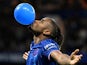 Chelsea's Christopher Nkunku celebrates scoring their first goal with a balloon on August 22, 2024