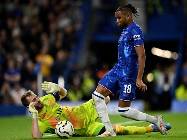 Servette's Jeremy Frick concedes a penalty against Chelsea's Christopher Nkunku on August 22, 2024