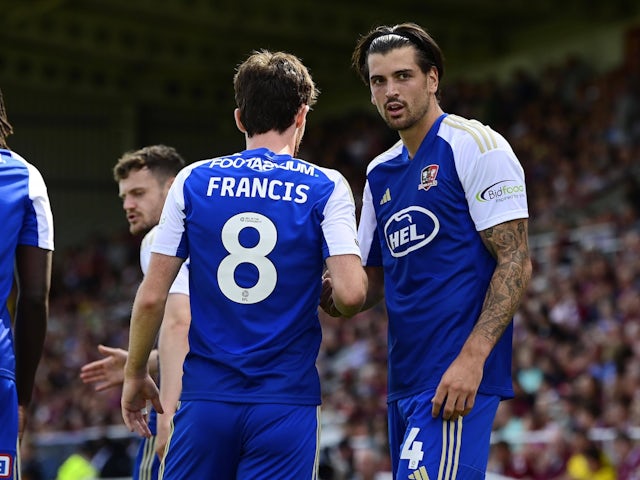 Goal celebrations for Tristan Crama of Exeter City on August 20, 2024