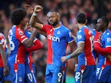 Crystal Palace's Jordan Ayew celebrates with teammates after scoring on February 24, 2024