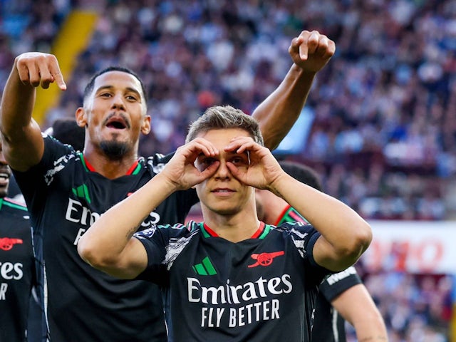 Leandro Trossard celebrates scoring Arsenal's first goal on August 24, 2024