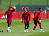 Manchester United Kobbie Mainoo, Hannibal Mejbri and Marcus Rashford (left-right) during a training session at the Trafford Training Centre on August 17, 2024