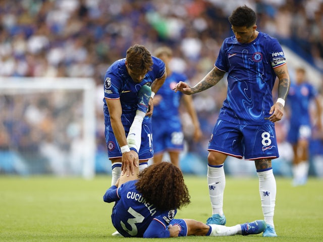 Chelsea defender Marc Cucurella receives treatment during Manchester City defeat on August 18, 2024.