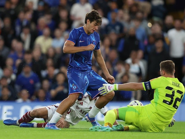 Chelsea's Marc Guiu takes the ball around Servette?s Jeremy Frick but fails to score during the UEFA Europa Conference League match at Stamford Bridge, London. on August 22, 2024