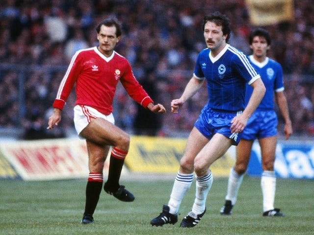 Manchester United's Ray Wilkins in action with Brighton & Hove Albion's Jimmy Case on May 26, 1983