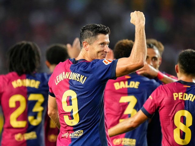 Barcelona's Robert Lewandowski celebrates after scoring on August 24, 2024