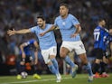 Manchester City's Rodri celebrates scoring their first goal with Ilkay Gundogan on June 10, 2023