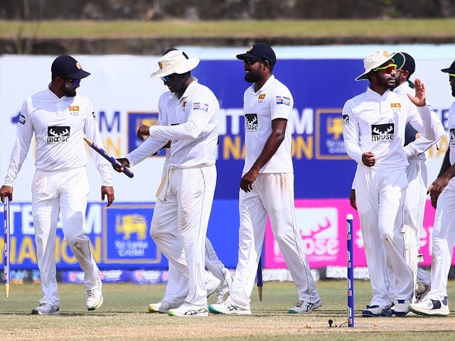 Sri Lankan teammates celebrate after winning the test series on the final day of the second Test match between Sri Lanka and Ireland on August 17, 2024