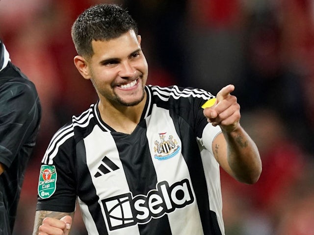 Bruno Guimaraes of Newcastle United celebrates after the penalty shoot out win during the Carabao Cup match at the City Ground, Nottingham on August 29, 2024