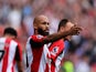 Bryan Mbeumo of Brentford celebrates like Yusuf Dikec the Turkey silver medallist in the 2024 Olympic Games after scoring his sides 1st goal in the 43rd minute to make it 1-0 against Southampton on August 31, 2024