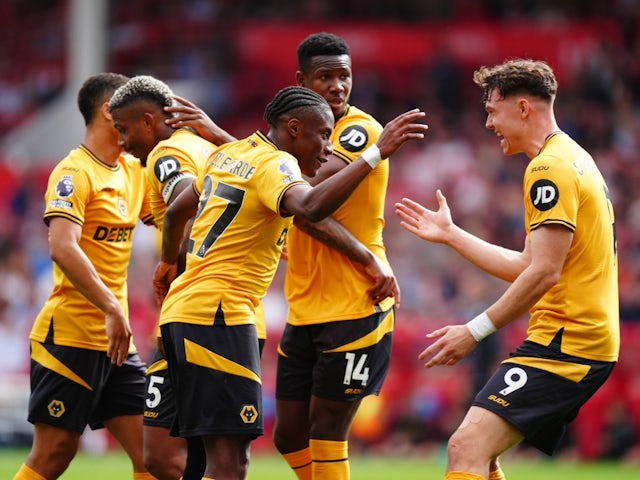 Wolverhampton Wanderers Jean-Ricner Bellegarde (centre) celebrates scoring their side s first goal of the game during the Premier League match at the City Ground, Nottingham on August 31, 2024