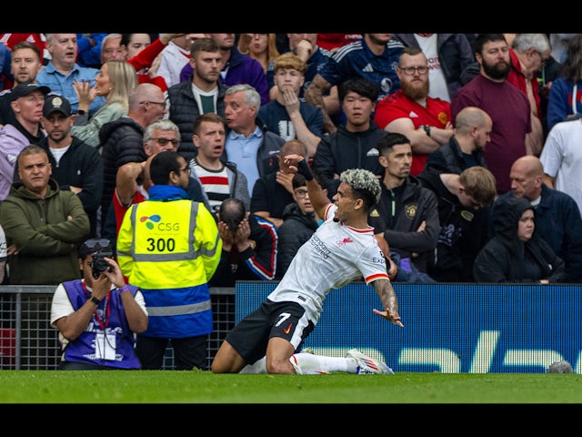 Liverpool s Luis Diaz celebrates after scoring the second goal during the FA Premier League match between Manchester United FC and Liverpool  on August 28, 2024