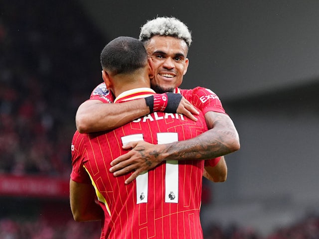 Liverpool's Luis Diaz celebrates with Mohamed Salah on August 24, 2024