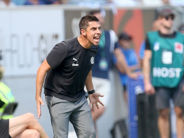 Manager of Holstein Kiel Marcel Rapp shouting at his players during his side's game against Hoffenheim on August 24, 2024