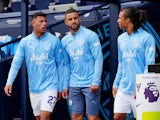 Manchester City's Matheus Nunes, Kyle Walker and Nathan Ake pictured before the match on August 24, 2024