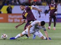 Evander of the Portland Timbers and Maya Yoshida 4 of the LA Galaxy struggle for possession of the ball on August 28, 2024