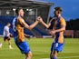 Jordan Shipley of Shrewsbury Town celebrates his goal on August 20, 2024