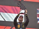 Charles Leclerc of Scuderia Ferrari HP F1 Team celebrates his race win on September 2, 2024