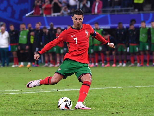 Portugal's Cristiano Ronaldo scores from the penalty spot on July 5, 2024