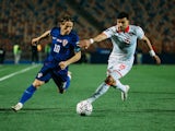 Luka Modric of Croatia is in action with Oussama Haddadi of Tunisia on August 31, 2024