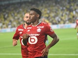 Jonathan David of Lille FC celebrates after scoring on August 13, 2024