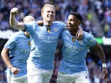 Manchester City's Kevin De Bruyne celebrates scoring their second goal with Savinho on August 24, 2024