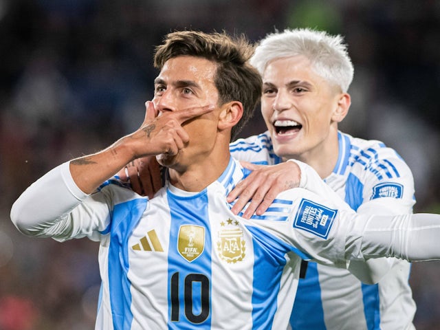 Argentina's Paulo Dybala celebrates with Alejandro Garnacho after scoring on September 5, 2024