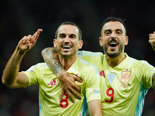 Spain duo Fabian Ruiz and Joselu celebrate a goal against Switzerland on September 8, 2024