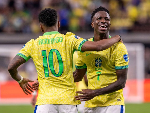 Brazil's Vinicius Junior celebrates with Rodrygo after scoring on June 29, 2024