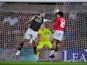 Ben Purrington of Exeter City in action with Josh Gordon of Walsall on August 13, 2024