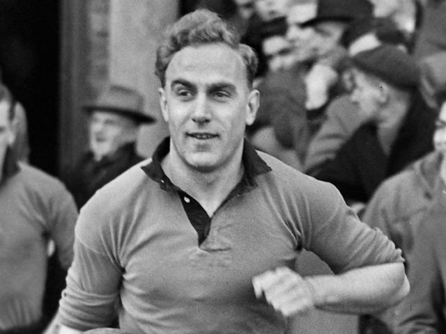 Billy Wright leads Wolverhampton Wanderers out in 1952