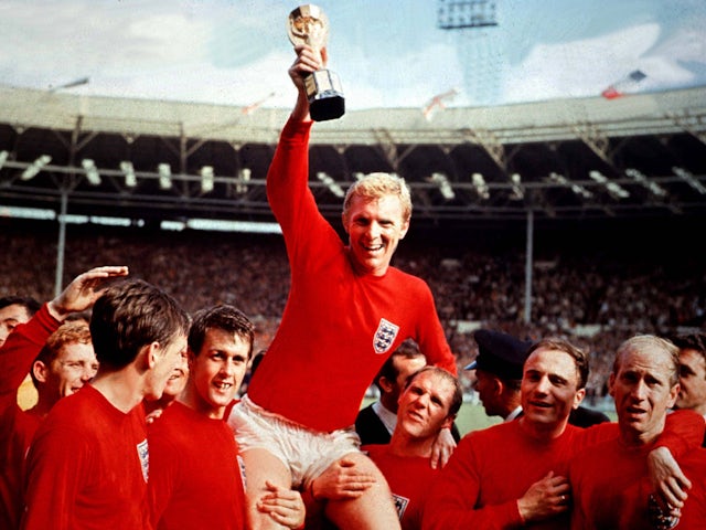 England's Bobby Moore holds the Jules Rimet Trophy aloft after winning the World Cup final in 1966