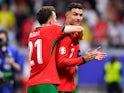 Diogo Jota and Cristiano Ronaldo of Portugal celebrate at Euro 2024 on July 1, 2024