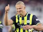 Manchester City's Erling Haaland celebrates with the matchball after scoring a hat-trick on August 31, 2024