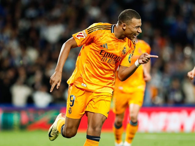 Real Madrid's Kylian Mbappe celebrates after scoring on September 14, 2024