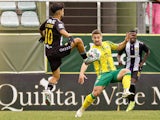 Luis Esteves (L) in action for Nacional on May 12, 2024